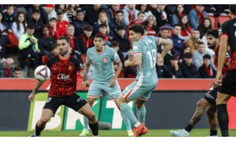 Holdånden vist af Atlético de Madrid-spillere